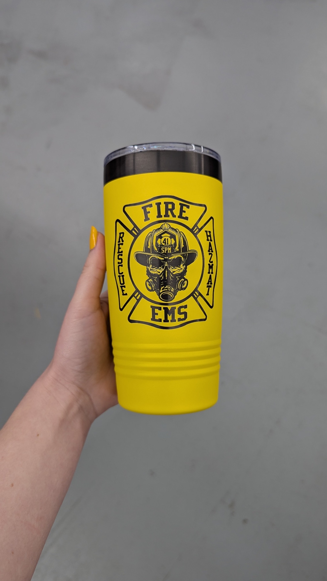 Custom laser-engraved yellow insulated tumbler with a fire and rescue crest by Hardiewear